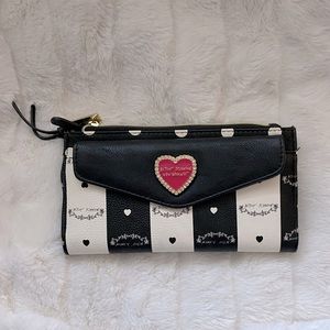 This wallet/clutch has plenty of room for cards and money.